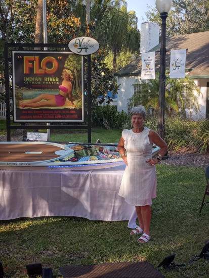 Woman standing in front of display